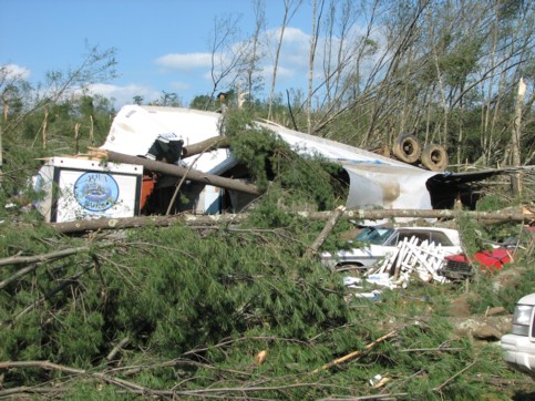 Trailer-upside-down-on-top-of-cars.